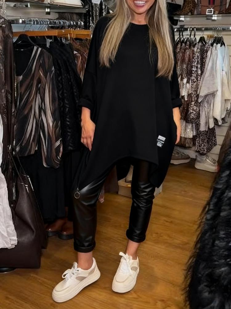 Aldona - アシンメトリートップスと無地のパンツ