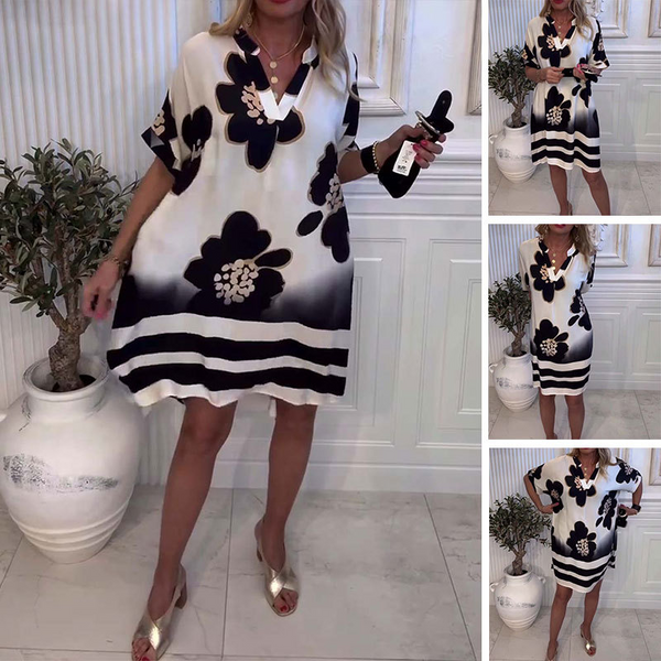 Yarina - プリント柄のゆったりとしたドレス、深いVネック