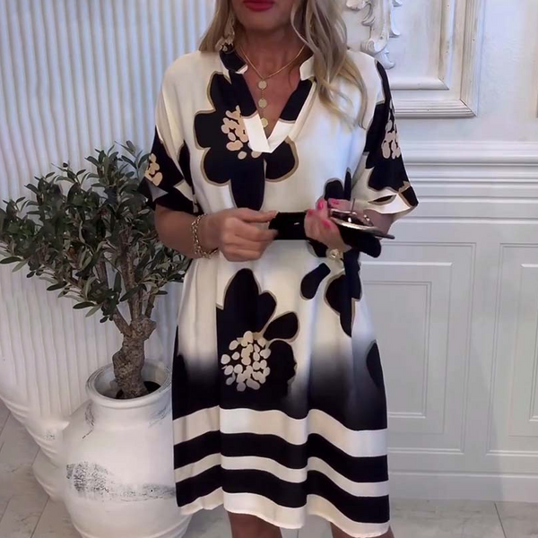 Yarina - プリント柄のゆったりとしたドレス、深いVネック