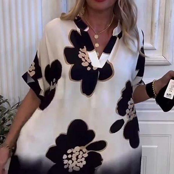 Yarina - プリント柄のゆったりとしたドレス、深いVネック